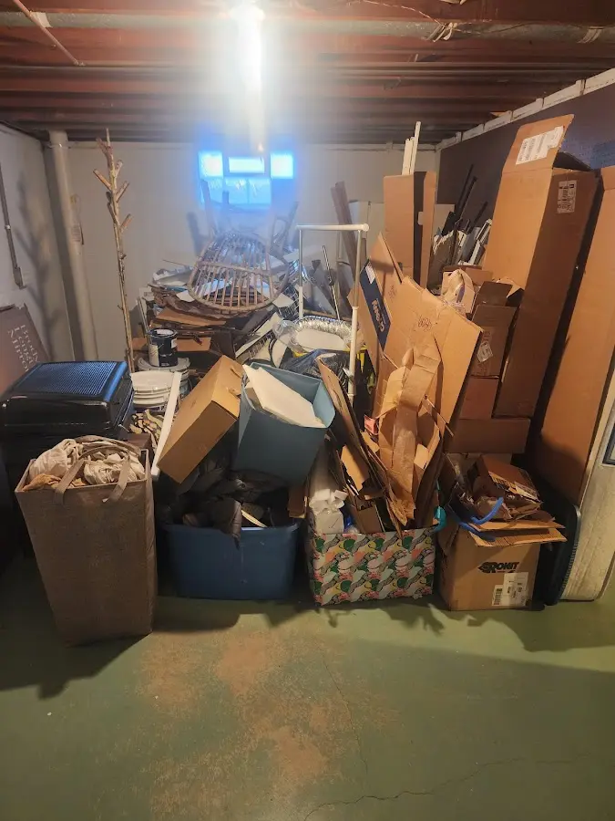 Roll-off dumpster container at job site for Yard Waste Dumpster Rental in Newton